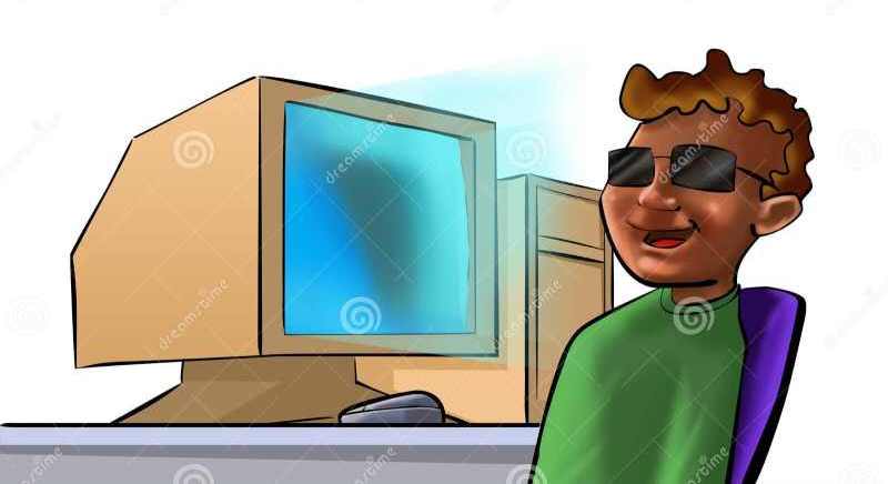 Rapaz de �cilos escuros com um computador - imagem de Davi Sales